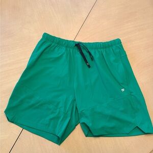 Fabletics Ventilated linerless 7’ inseam Men's Green Athletic Shorts. Never Worn